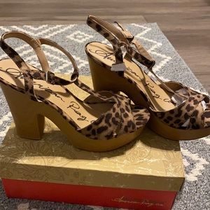 Leopard print clogs sandals